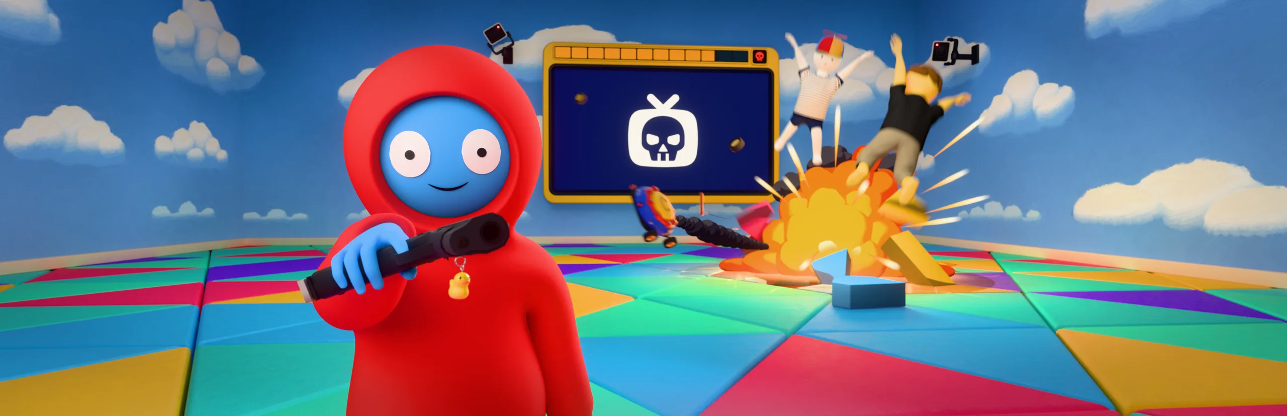 The mascot with its pistol, a screen showing a skull, and an explosion that throws two players into the air